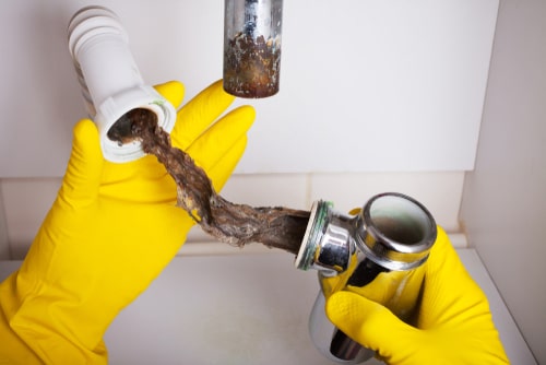 hair clogging drains